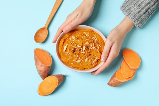 Dog enjoying all-natural meal with sweet potato for skin allergies and itchy coat relief